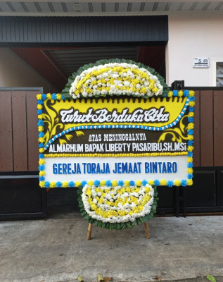 Papan Bunga Duka di Kelam Tengah